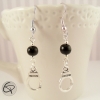 Boucles d'oreilles pour femme avec menottes et perles noires