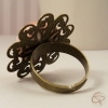 support fleur dentelée sur anneau bronze