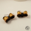 Boucles d'oreilles raffinées femme noeuds dorés