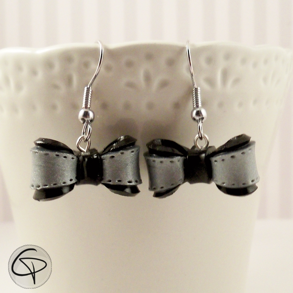 Boucles d'oreilles noeuds argentés