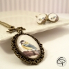 Pendentif femme original oiseau avec noeud bronze