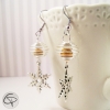 Boucle d'oreille pendante flocon de neige