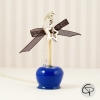 Sautoir pendentif pomme d'amour bleu roi avec un noeud ruban noir