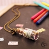 Sautoir fiole en verre avec bons points pour maîtresse d'école
