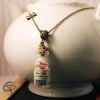Cadeau original maîtresse pendentif fiole bons points