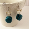 belles boucles d'oreilles motif macaron couleur vert émeraude