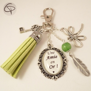 Bijou de sac pompon vert