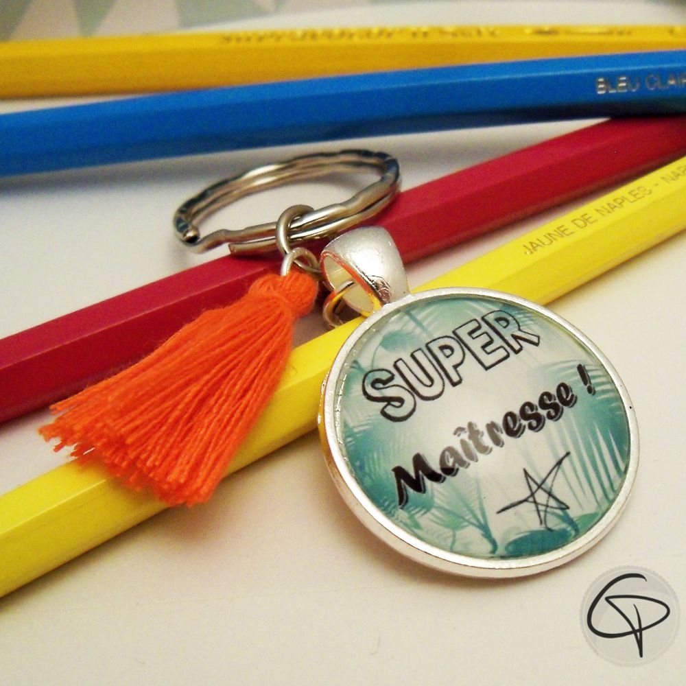 Porte-clef super professeure avec pompon orange