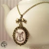 Pendentif corset femme original médaillon bronze