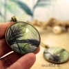 Long sautoir bronze avec feuilles de palmier dans médaillon en verre