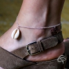 Bracelet de cheville pour femme décoré d'un coquillage