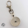 Porte-clé argenté médaillon en verre