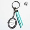 Porte-clef argenté avec médaillon personnalisable