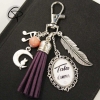 Bijou de sac original pompon violet