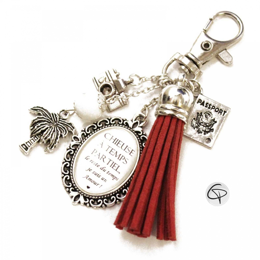 Bijou de sac pompon rouge