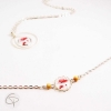 Bracelet coquelicot ajustable en métal argenté avec perles en bois – Chat Pristy