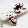 boucles d'oreilles argentées femme médaillon tête de mort 3d hallowwen