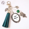 Bijou de sac pompon vert