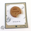 Merci maîtresse écrit sur un biscuit modelé à la main