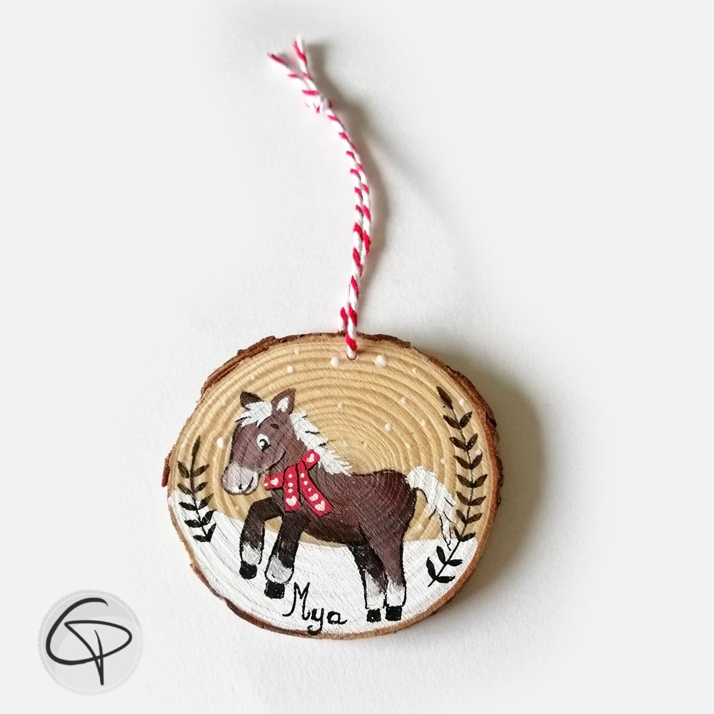 Boule de Noël en bois originale illustrée d'un cheval