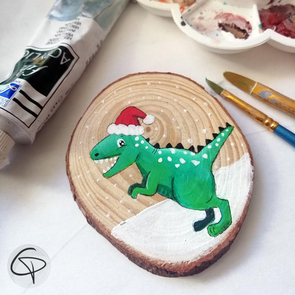 Petit dinosaure tout vert pour décorer le sapin de Noël de votre enfant